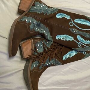 Dream Catcher Cowgirl Boots. These are brown with blue dream catchers.